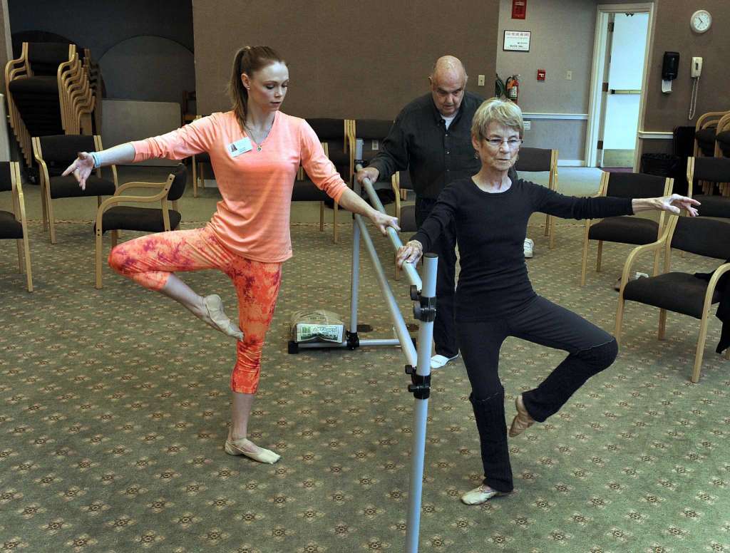 seniors practicing ballet with an instructor at Pomperaug Woods