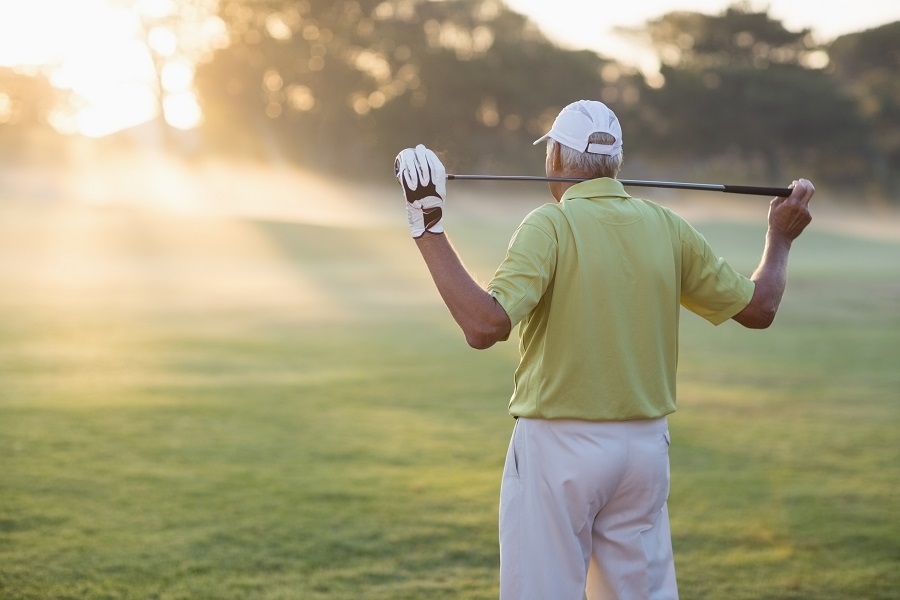 man golfing