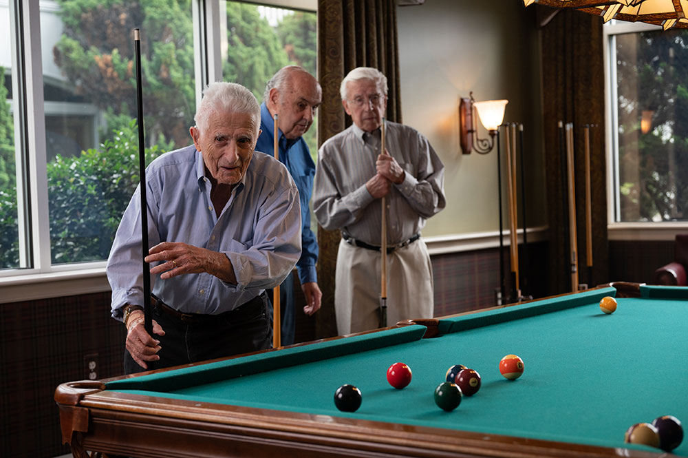 men playing pool