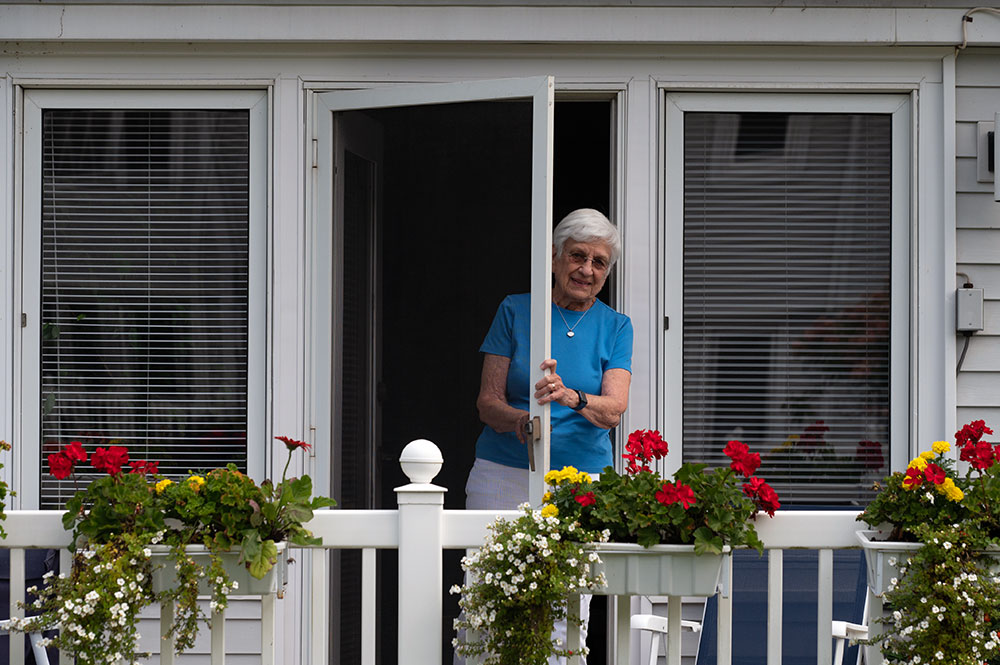 Female resident on her deck