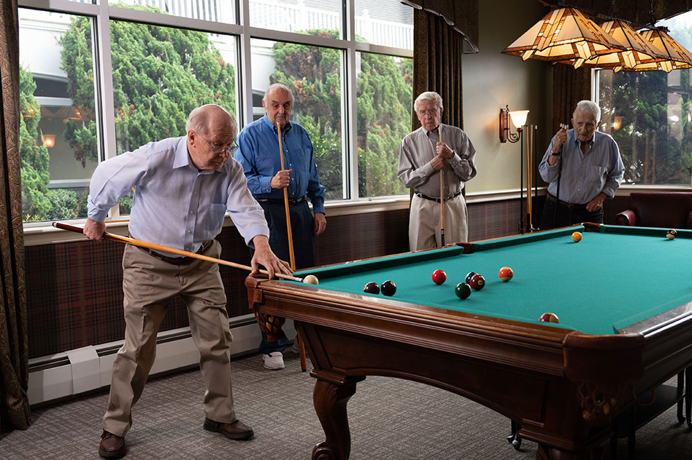 men playing pool