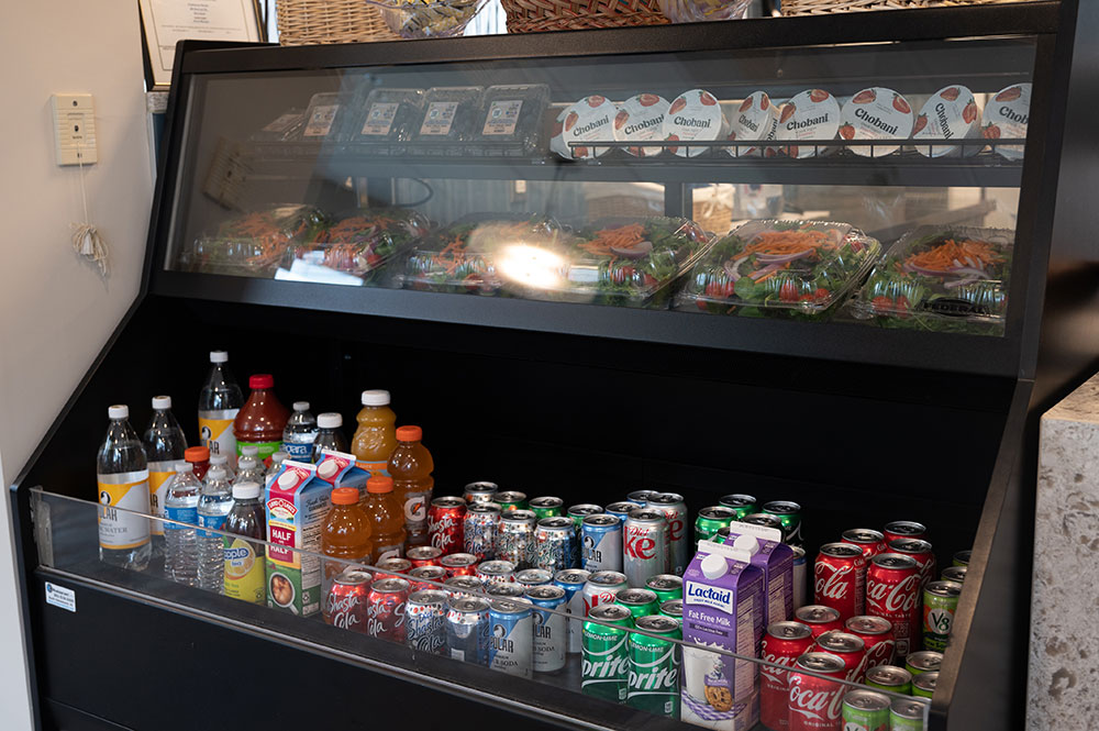 snack case of beverages and salads