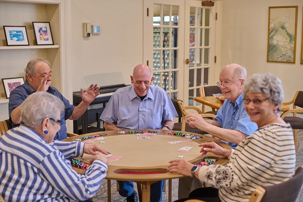group of friends playing cards