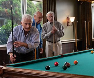 men playing pool