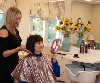 Woman getting her hair cut